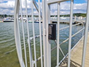 Digital keypad lock on gate at marina