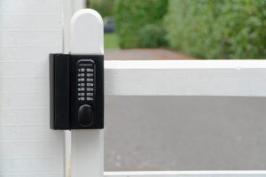 white wooden timber garden gate with digital keypad lock with code installed