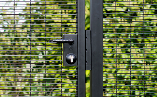 black stainless steel lock on metal gate