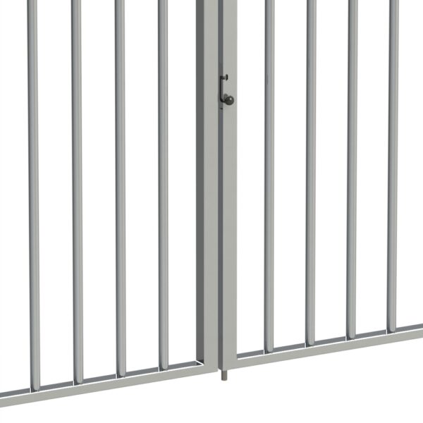 Light grey metal gate with concealed drop bolt installed. Small round handle grip on top middle part of gate. Small bar sticking out below gate