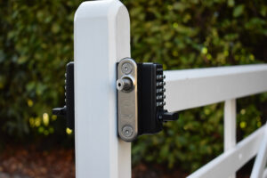 surface-fixed keyless lock on wooden gate