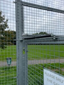 gas strut gate closer on tennis court