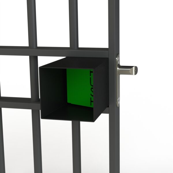 Grey metal gate with green push pad lock installed. Around the push pad is a protective shroud in the form of a square box