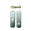 Opened keypad lock with two parts side by side. Left is internal lever handle. Right is 14 button digital keypad lock with thumbturn